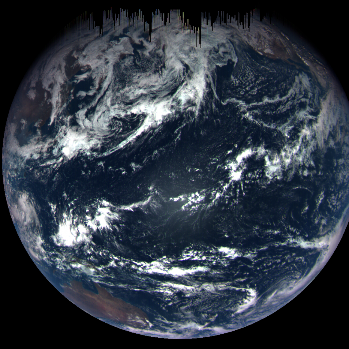 On Sept. 22, at a distance of 105,600 miles, the OSIRIS-REx MapCam captured this color image of Earth. Dark "icicles" at the top of the image were caused by short exposure time.